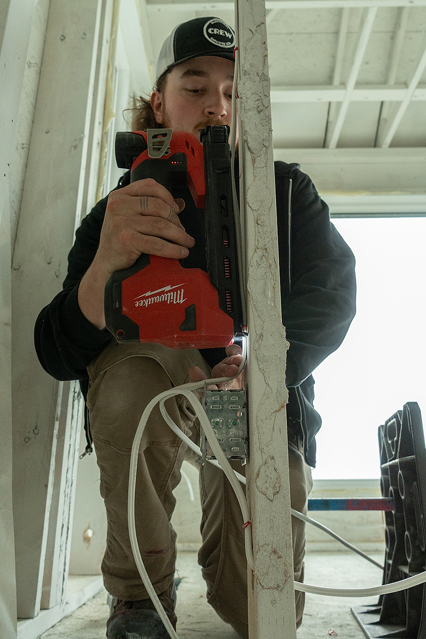 Crew Electrical Services troubleshooting a tripping breaker in Altadore