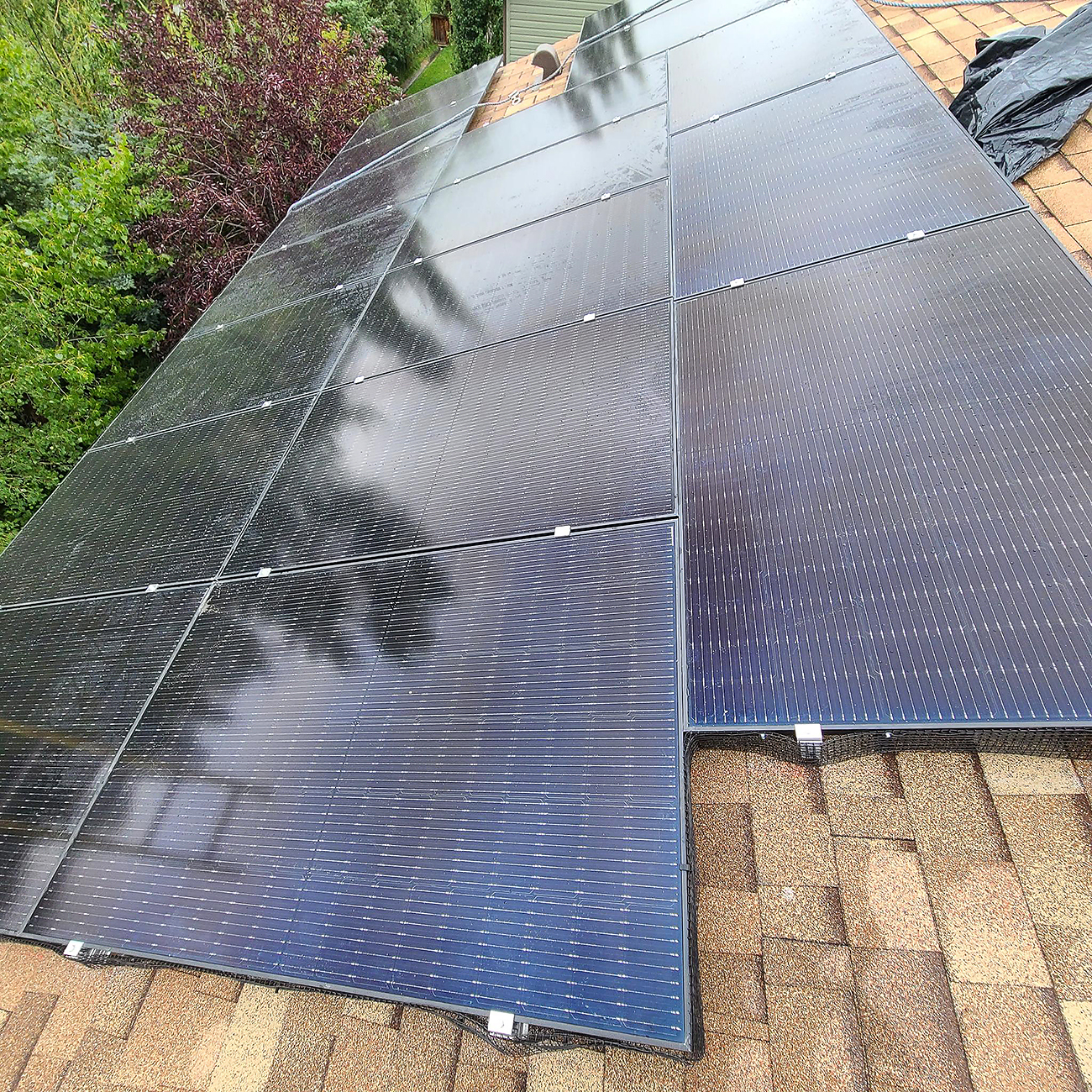 Crew Electrical Services team providing rooftop residential solar panel installations in Calgary.
