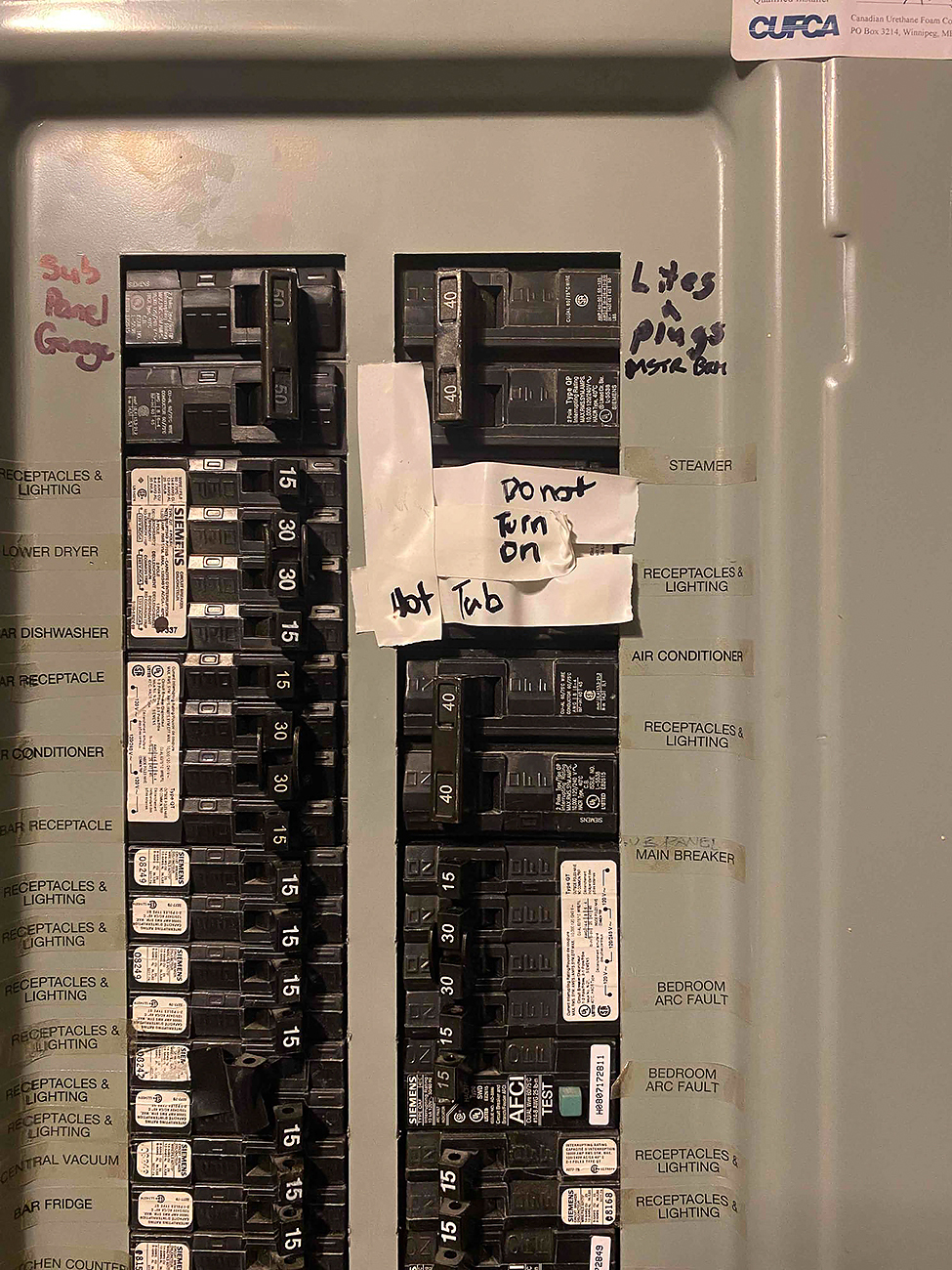 200 amp electrical panel upgrade in Southwest Calgary by Crew Electrical Services with clean labeling
