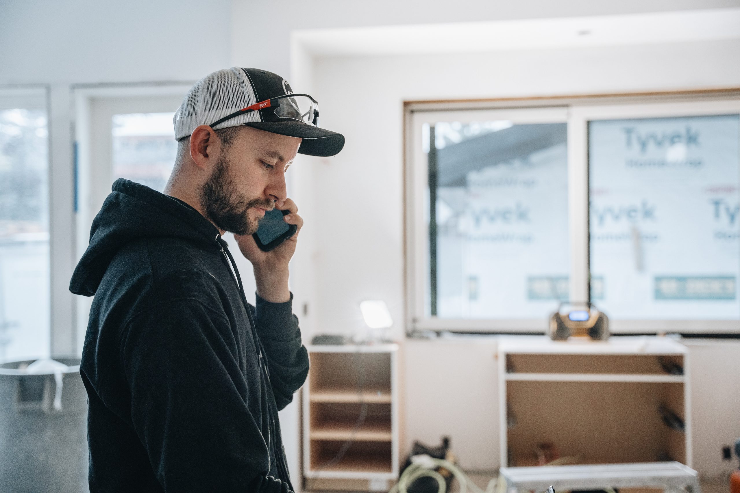 Crew Electrical Services setting dimmer switches in a Heritage Pointe living room