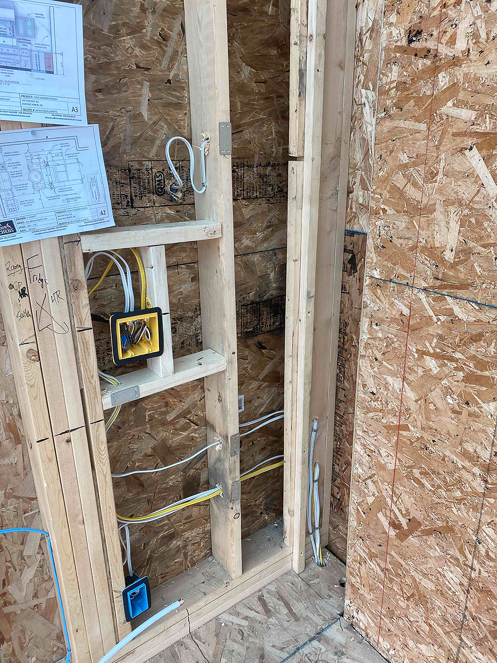 Crew Electrical Services meeting a Calgary electrical inspector after a rough-in