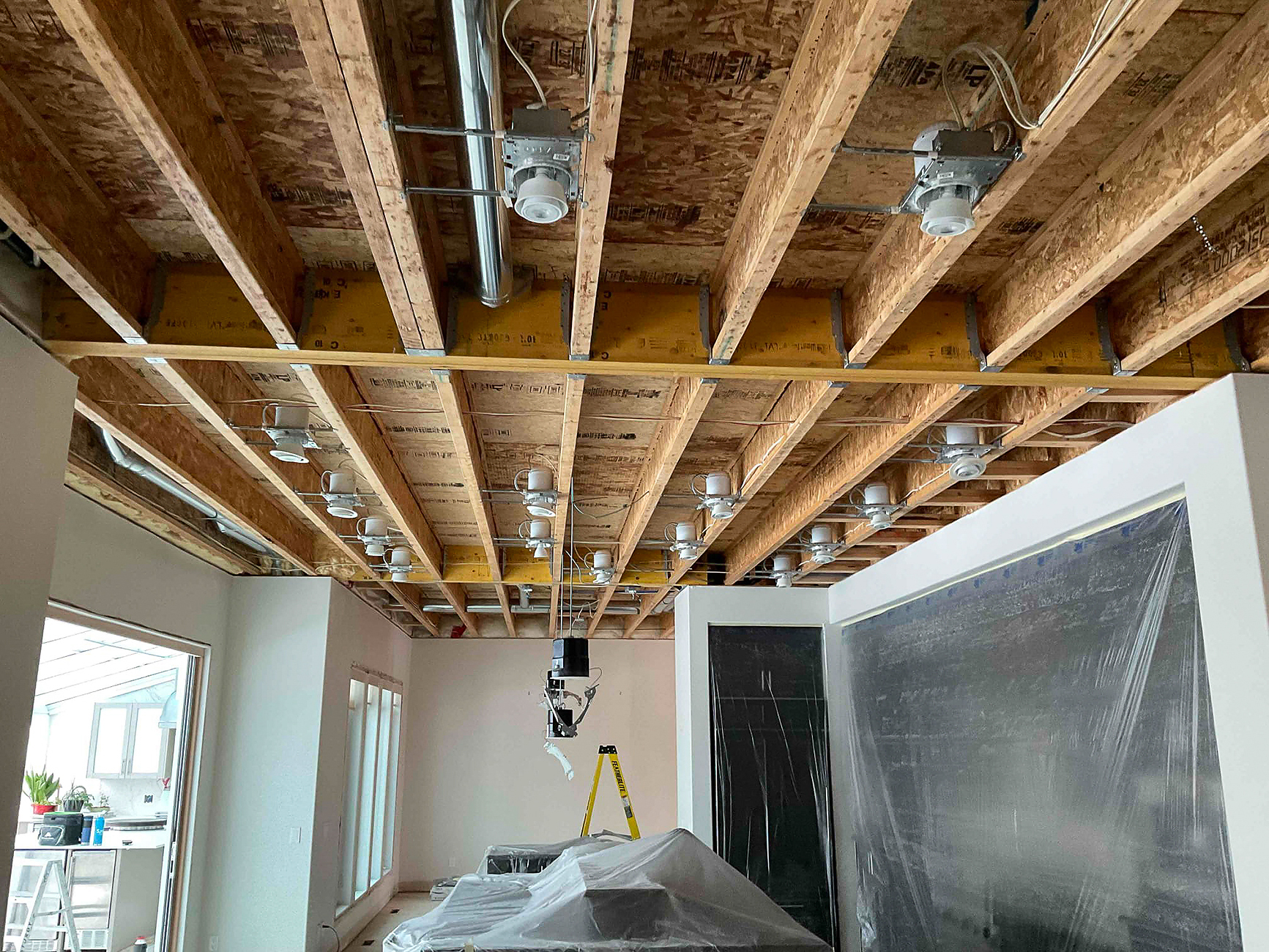 Crew Electrical Services wiring rough-in for a Springbank Hill renovation