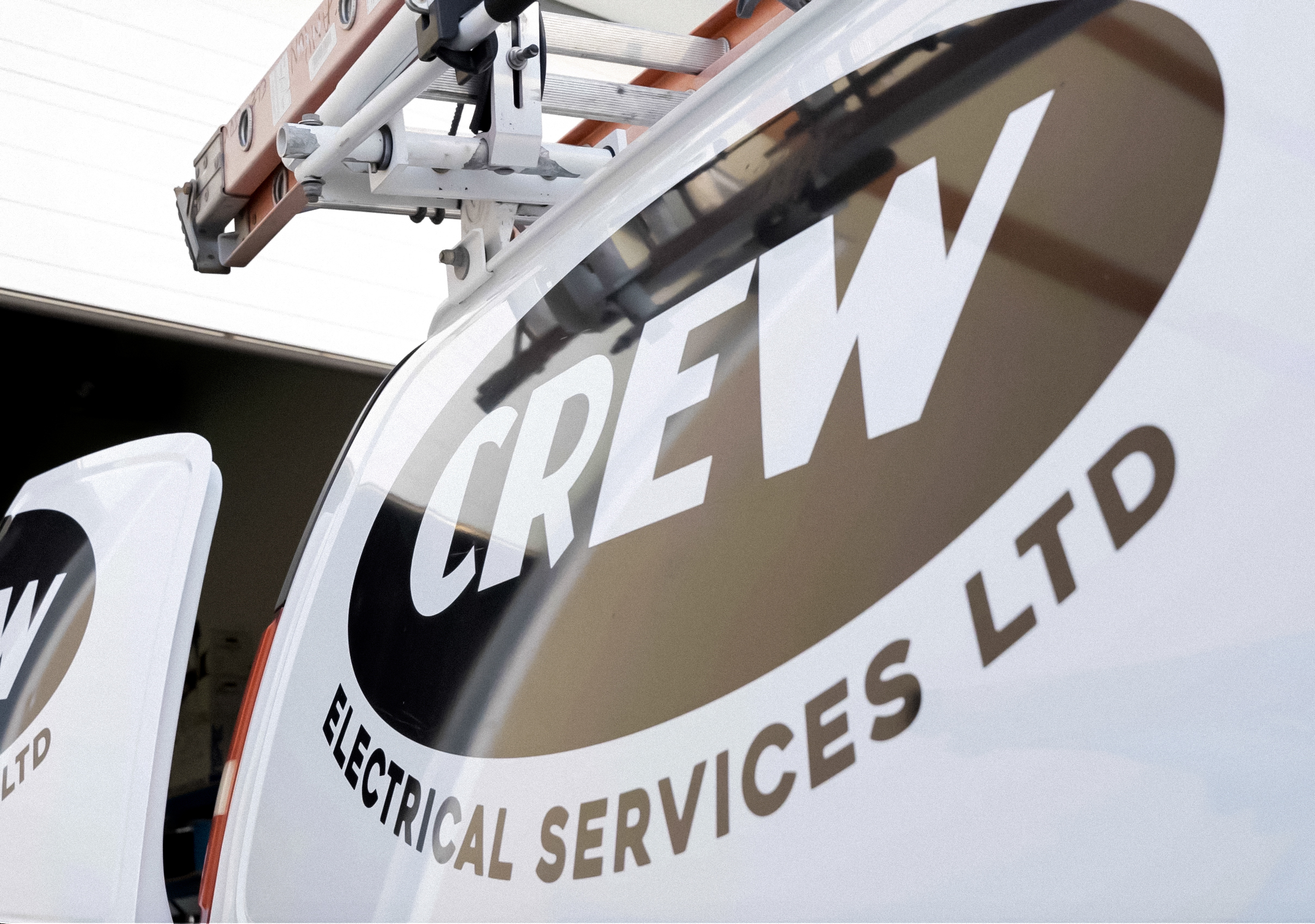 Crew Electrical Services electrician working in a Mount Royal home